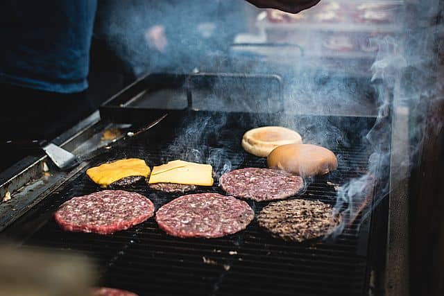 Hamburger meat on a grill